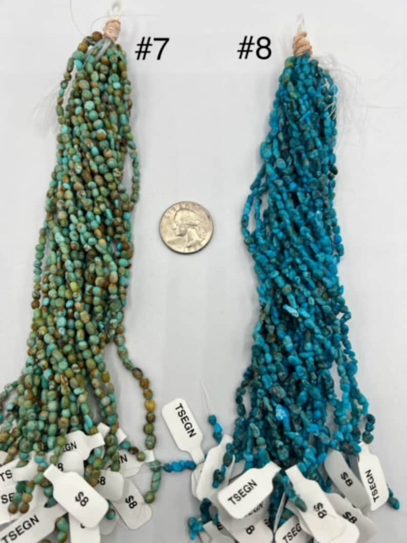 May include: Two strands of turquoise beads, one green and one blue, with price tags and the numbers #7 and #8.