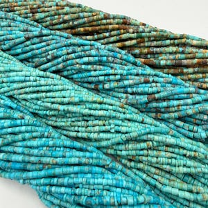 May include: Multiple strands of small, cylindrical turquoise beads arranged in parallel rows. The beads display a gradient of colors ranging from deep, earthy brown and muted green tones at the top to vibrant, bright sky blue shades at the bottom.