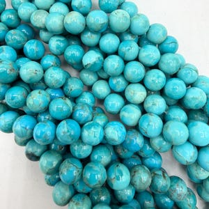 Kingman Turquoise 8-9mm Round Beads -Sold by 8" Strand