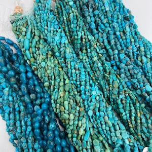 May include: A collection of turquoise gemstone beads in various shades of blue and green. The beads are strung on multiple strands and are ready for jewellery making.