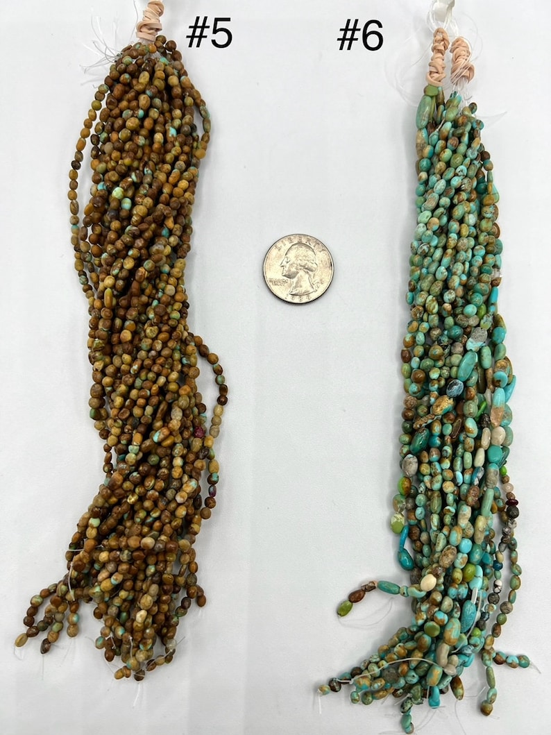May include: Two strands of turquoise beads, one brown and one blue-green, with a US quarter for scale. The strands are labeled #5 and #6.