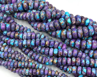 May include: A strand of purple and turquoise gemstone beads with gold flecks. The beads are round and have a slightly irregular shape. The beads are strung on a clear thread.