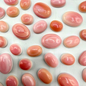 Pink Conch kalibrierte ovale Cabochons - 10 x 12 mm, 10 x 14 mm & 13 x 18 mm - einzeln erhältlich