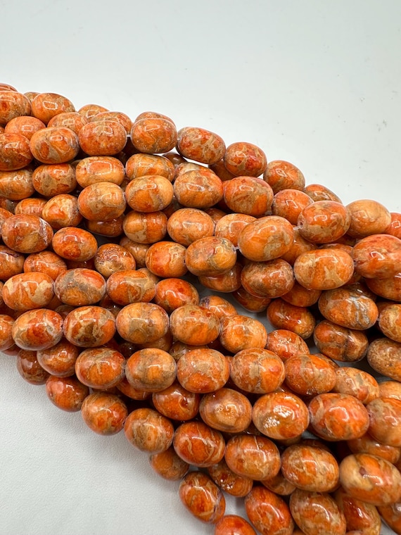 Apple Coral Potato Beads 8x10mm Sold by 8