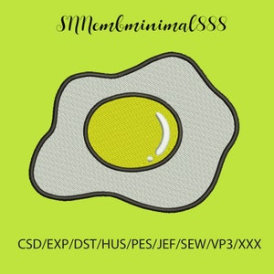 May include: A white and yellow embroidery design of a fried egg. The design is outlined in black thread. The text "SMMembminimals88" and "CSD/EXP/DST/HUS/PES/JEF/SEW/VP3/XXX" are below the design.