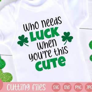 May include: White baby onesie with green shamrocks and black text that reads "Who needs luck when you're this cute".