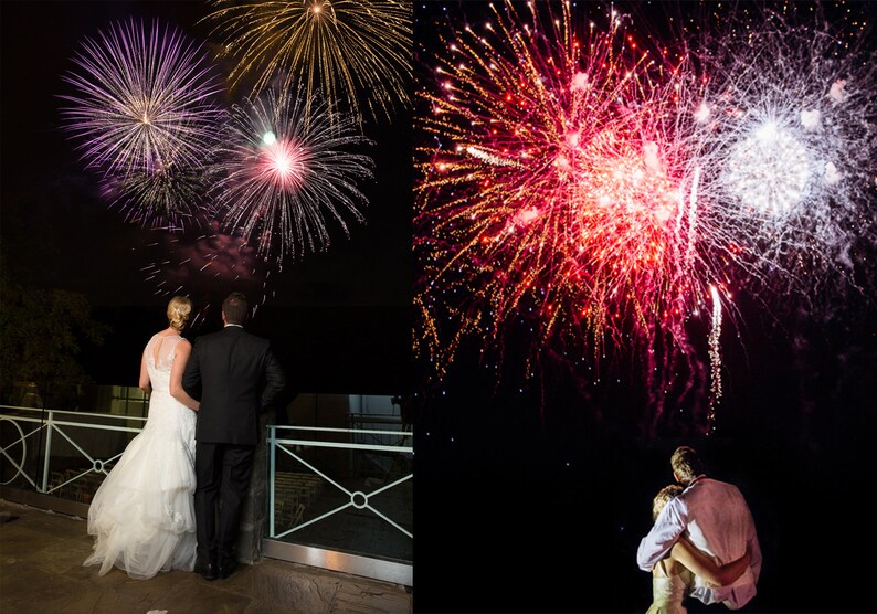 May include: A couple watches a fireworks display at night. The bride is wearing a white wedding dress and the groom is wearing a black suit. The fireworks are in the background and are red, white, and blue.