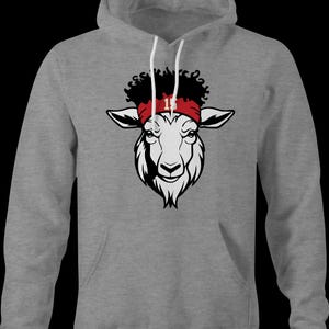 May include: A grey hooded sweatshirt featuring a black and white goat head graphic. The goat is wearing a red headband with the number 15 on it.