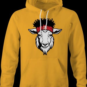 May include: A yellow hoodie featuring a white goat head graphic. The goat is wearing a red headband with the number 15 on it.
