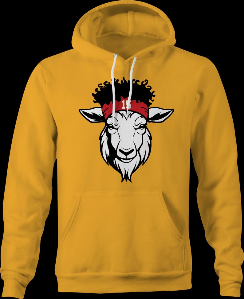 May include: A yellow hoodie featuring a white goat head graphic. The goat is wearing a red headband with the number 15 on it.