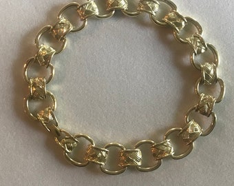 Collana vintage Trifari color oro con maglie testurizzate intrecciate tra anelli lucidi 17"