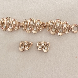 Conjunto de pulsera y pendientes con espirales de diamantes de imitación vintage de Trifari