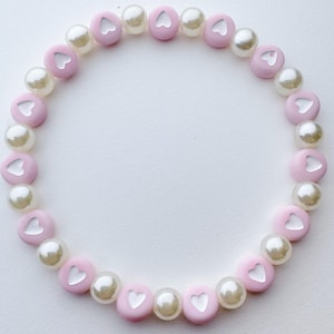 Pastel pink heart beaded bracelet, with plastic pearls, 7 inch stretchy beaded bracelet