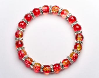 Red and yellow crackle glass beaded bracelet, with silver rhinestone beads, 6 inch stretchy beaded bracelet