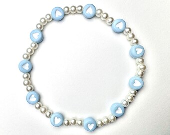 Pastel blue heart beaded bracelet, with plastic pearl beads, 7 inch stretchy beaded bracelet