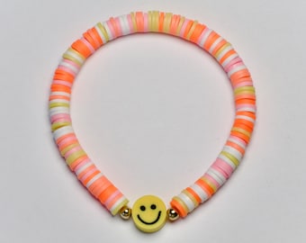 Yellow smiley face bracelet, pink, orange, yellow clay beaded bracelet, 6.5 inch stretchy beaded bracelet
