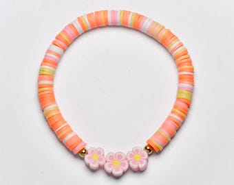 Pink flower bracelet, pink, orange, yellow clay beaded bracelet, 6.5 inch stretchy beaded bracelet