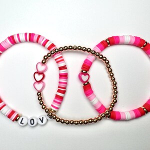 Pink, red, and white bracelets set of 3, 7 inch stretchy beaded bracelet
