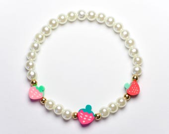Strawberry clay bracelet, with pearl and gold spacer beads, 6.5 inch stretchy beaded bracelet