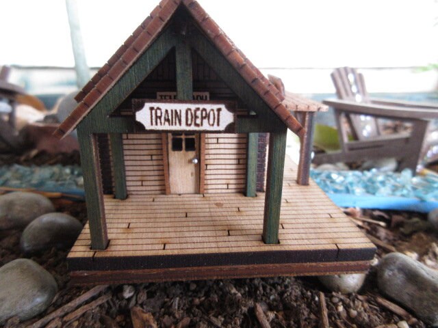 thumbnail image 2 of 10-Piece Outhouse Set – HO Scale 1:87 Old West Railway Scenery, Unpainted 2 of 4