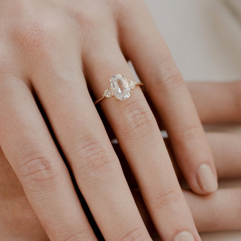 three stone oval engagement ring