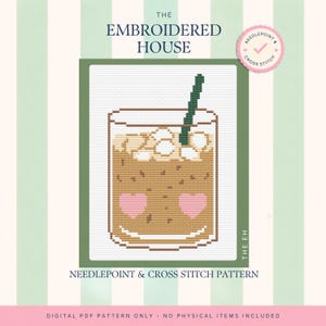 May include: A cross stitch pattern featuring a glass filled with a light brown iced beverage, white ice cubes, and a dark green straw. The glass is decorated with two pink hearts. The text reads THE EMBROIDERED HOUSE and NEEDLEPOINT & CROSS STITCH PATTERN.