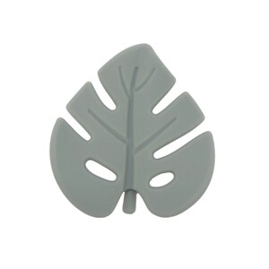 May include: A gray silicone leaf shaped teether with a textured surface and holes cut out.