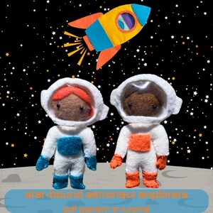 May include: Two felt astronaut dolls with orange and blue accents stand on a grey surface with a rocket ship flying above them against a black background with white stars. The text "star-bound astronaut explorers pdf pattern & tutorial" is at the bottom of the image.