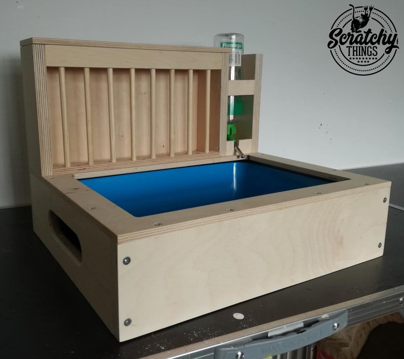 3in1 bunny rabbit hay feeder with built in litter box and a free standing water bottle holder hay feeder hay rack Nibbler Combo Mini