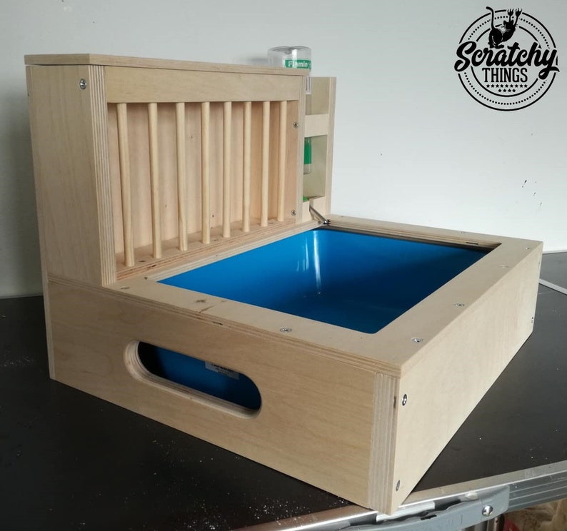 3in1 bunny rabbit hay feeder with built in litter box and a free standing water bottle holder hay feeder hay rack Nibbler Combo Mini