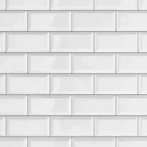 May include: White subway tiles with a bevelled edge. The tiles are arranged in a brick pattern.