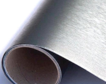 Vinilo gris metalizado de plástico con reverso adhesivo de acero cepillado (2 m x 45 cm)