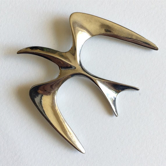 Sleek bird in flight silver tone vintage pin- sig… - image 1