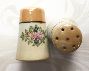 Vintage Japan lusterware salt and pepper shaker set.