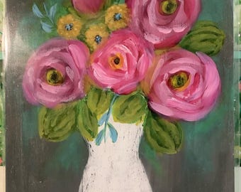 May include: An acrylic painting on a rectangular canvas featuring a bouquet of vibrant pink roses and small yellow flowers in a white vase. The background is a dark gray with hints of teal green. The brushstrokes are visible and textured throughout.