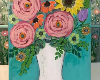 May include: A rectangular painting on a teal background featuring a white vase filled with a bouquet of large pink roses, a bright yellow sunflower, orange coneflowers, small light green blossoms, and a single purple tulip with green leaves.