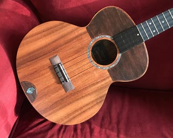 Deluxe Venezuelan cuatro/Baritone ukulele hybrid: Acacia/Walnut and abalone acoustic/electric