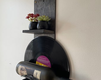 Vinyl record bottle holder, vinyl record wine rack, wine rack, upcycled wall art, vinyl record art, wall mounted bottle holder