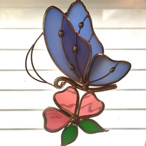 Stained Glass Butterfly with Flower Suncatcher/ 5”h x 4 1/2”w Yellow Butterfly suncatcher w purple flower/ Blue Butterfly w pink flower