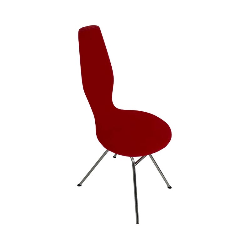 May include: A red upholstered chair with a unique, curved back and a chrome base.