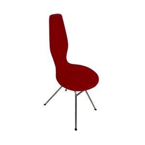 May include: A red chair with a unique, curved back and a chrome frame. The chair has a modern design and is perfect for a dining room or living room.