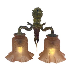 Art deco - Antique wall mounted lamp - Brass base and two pink satin glass shades with a skirt motif