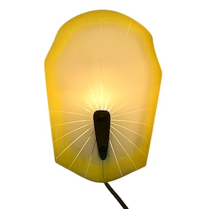 Mid Century Modern - Wall mounted lamp with yellow and white glass shade and brass detail