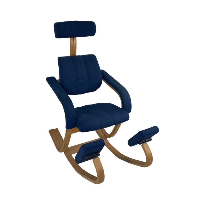 May include: A blue rocking kneeling chair with a headrest and footrest. The chair is made of wood and fabric.