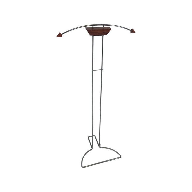 May include: A silver metal coat rack with a curved top and a wooden base. The rack is freestanding and has a simple design.