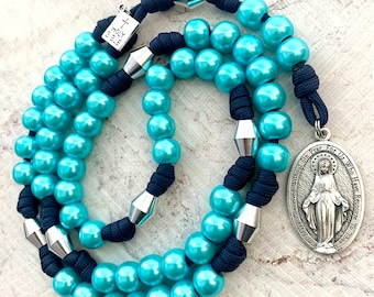 Seven Sorrows Rosary. 12mm Pearl Blue Beads. Aluminum Aircraft Grade Our Father Beads. Large Miraculous Medal. (550 Paracord)
