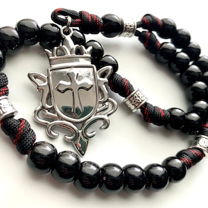Anglican Rosary w/Stainless Steel Cross Shield. 12mm Acrylic Black Gloss Beads and Metal Celtic Cruciform Beads. (550 Paracord)