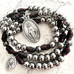 Seven Sorrows Gunmetal Finish Rosary. 10mm ABS Plastic Beads. Metal Our Father Beads. Large Miraculous Medal. Added Lady of Sorrows Medal.