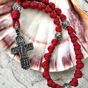 Rosario anglicano de acero inoxidable con cruz ortodoxa. Cuentas cruciformes de aleación metálica de 12 mm. Paracord rojo n.° 550.