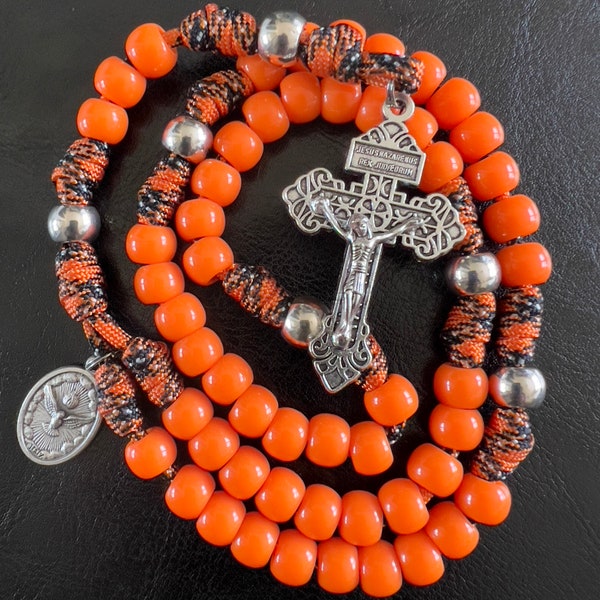 Orange Pardon CrucifIx Catholic Rosary. 10mm Acrylic Beads. Silver Metal Our Father Beads. Your choice of Saint Medal. #550 Paracord.